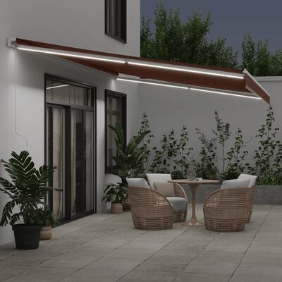 vidaXL Toldo retrátil manual com luz LED 600x350 cm castanho