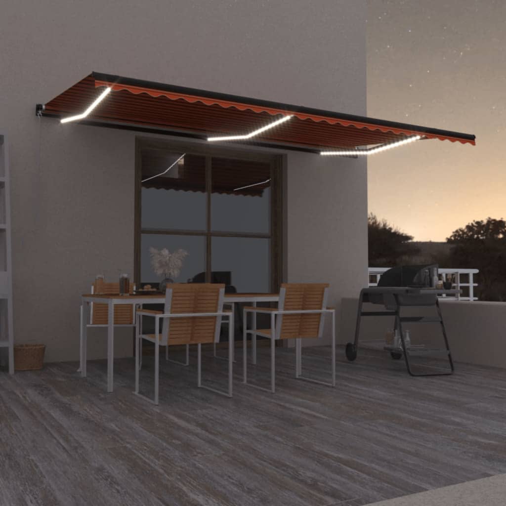 vidaXL Toldo retrátil manual com LED 600x350 cm laranja e castanho