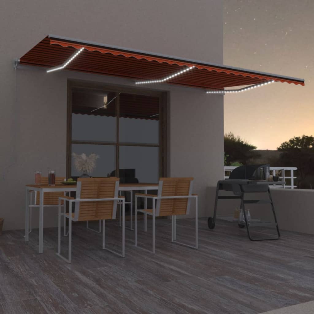 vidaXL Toldo retrátil manual com LED 600x350 cm laranja e castanho