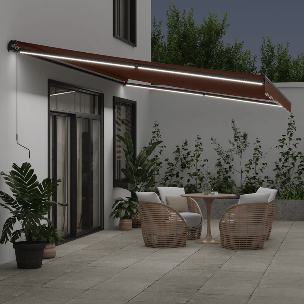 vidaXL Toldo retrátil manual com luzes LED 500x350 cm castanho