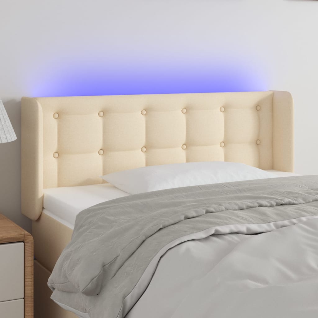 vidaXL Cabeceira de cama c/ luzes LED tecido 83x16x78/88 cm cor creme